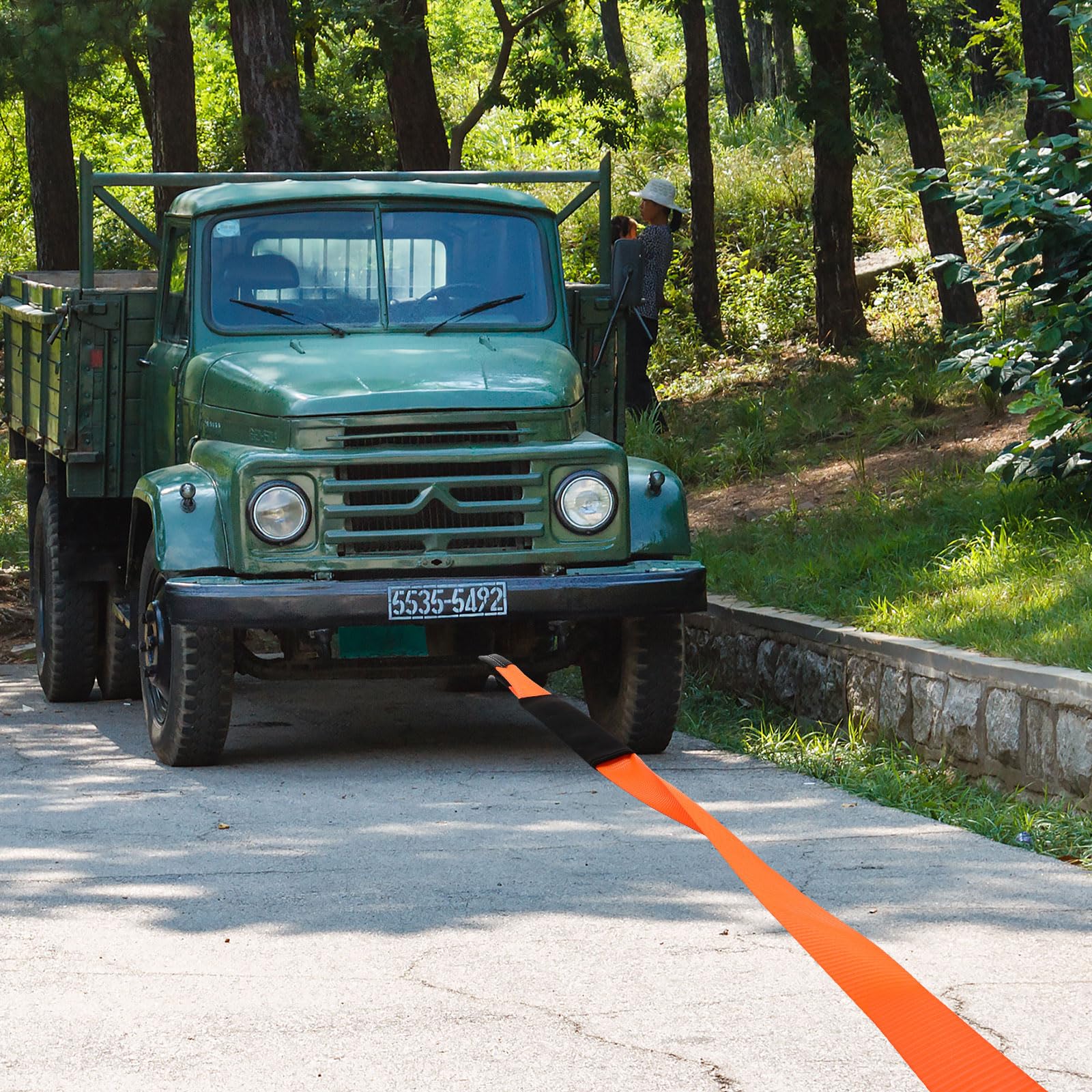 Windyun strap stretched between vehicles showing full 50 ft reach and clearance
