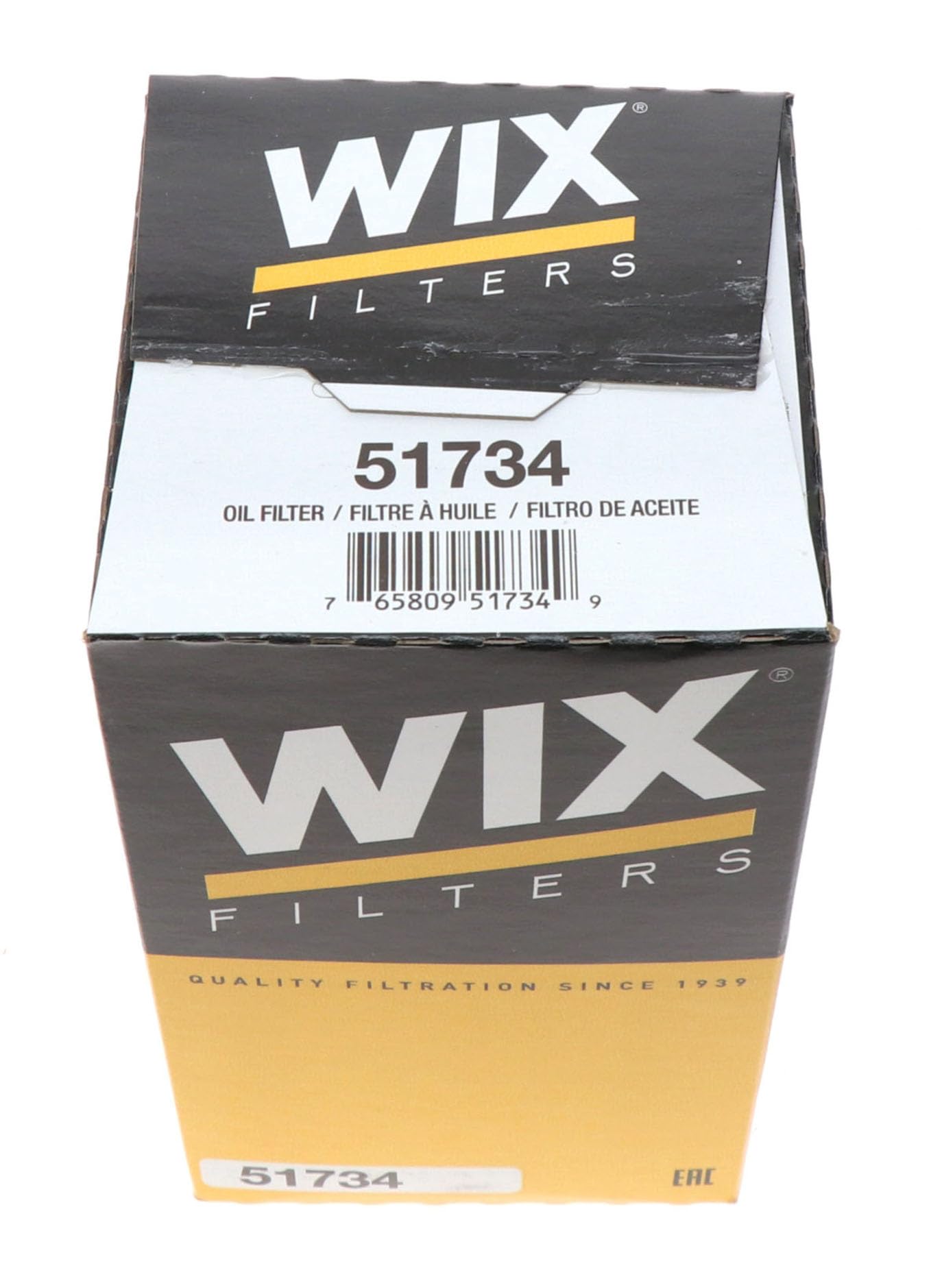WIX 51734 next to a ruler for scale showing compact, high-capacity design