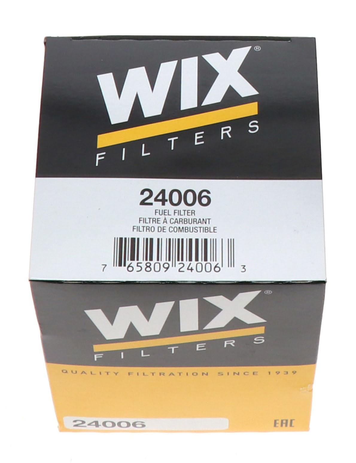 Wix fuel filter held in hand for scale showing compact size and easy handling