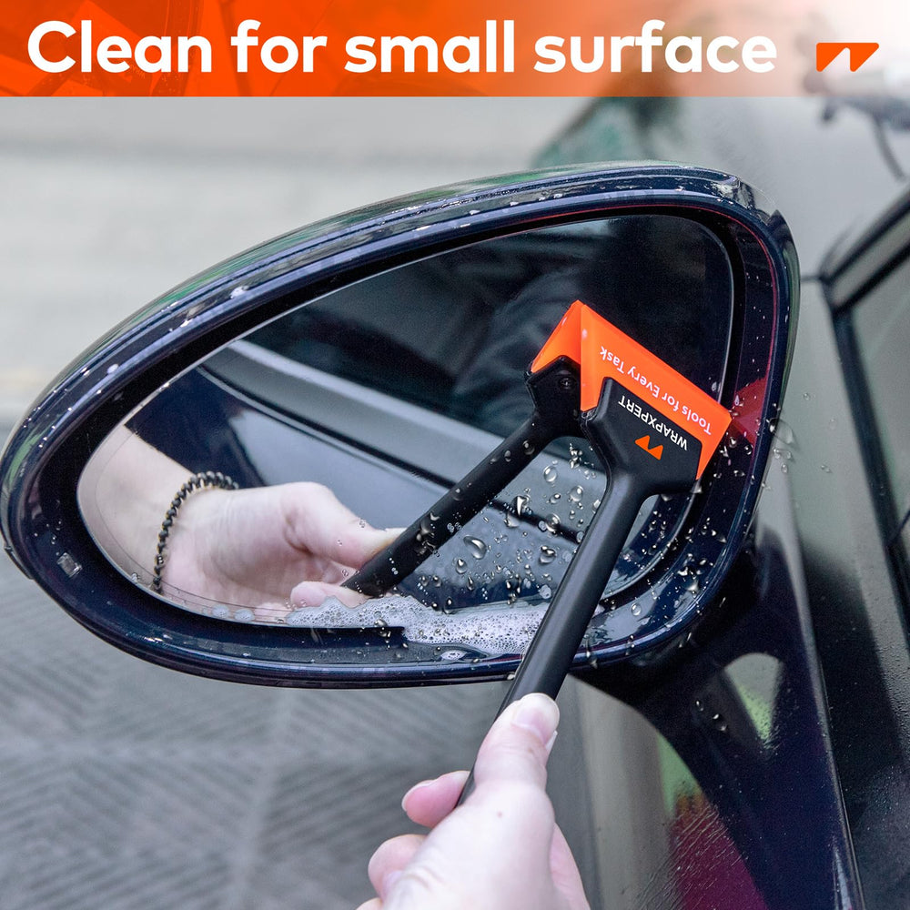 WRAPXPERT smoothing window tint on rear glass yielding bubble-free film