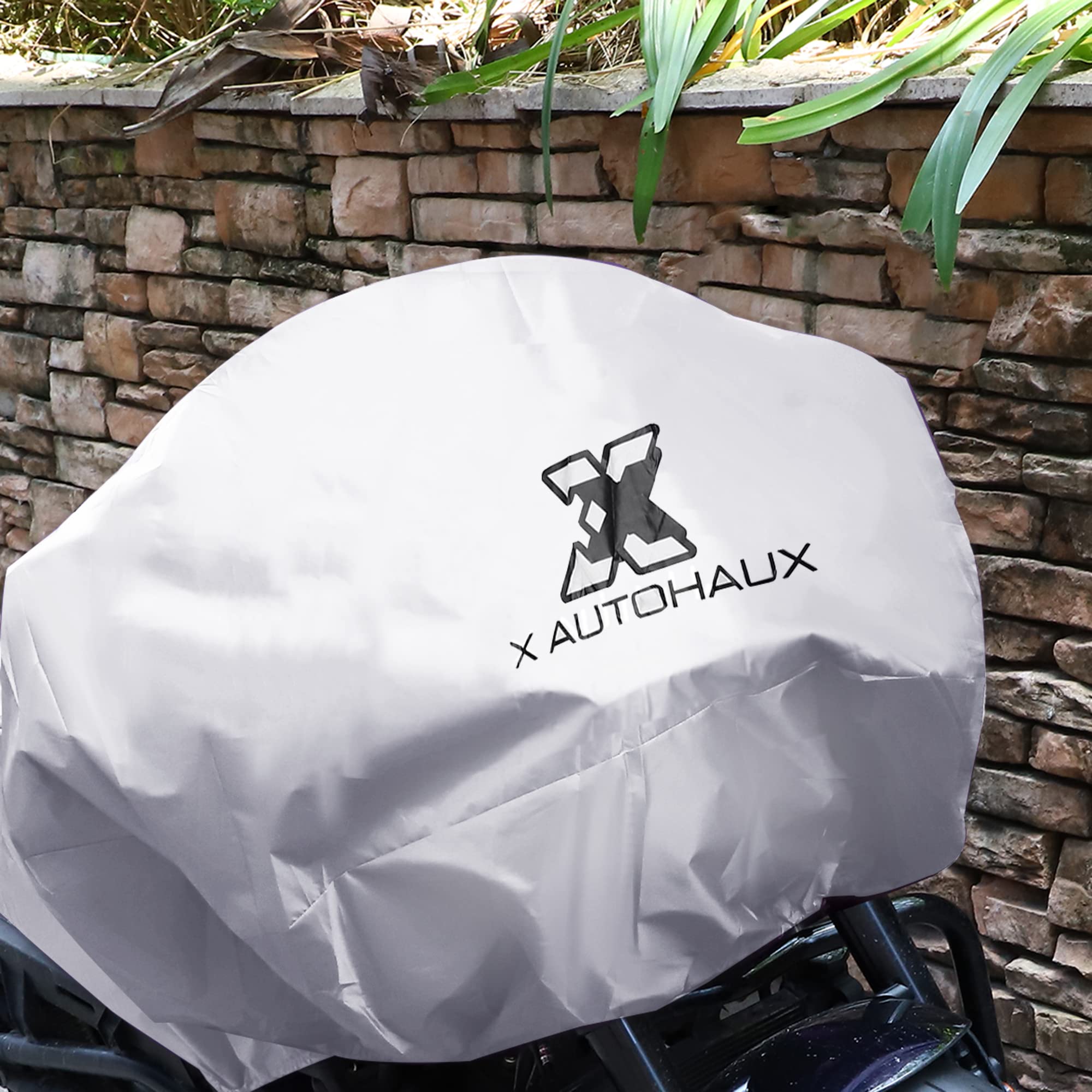 X AUTOHAUX half cover in use on parked touring bike offering weather shield