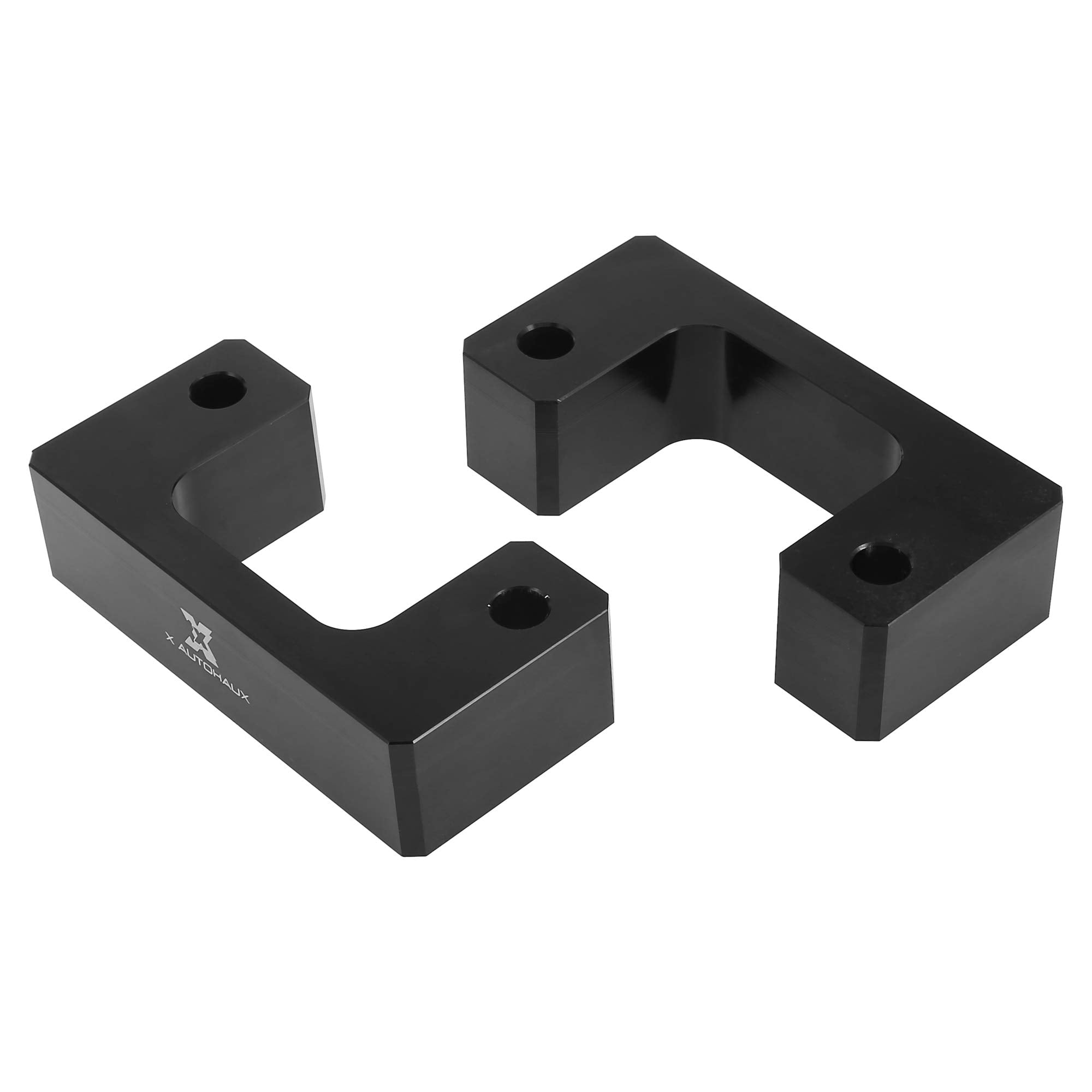 X AUTOHAUX spacer beside ruler showing 2.5-inch lift scale benefit