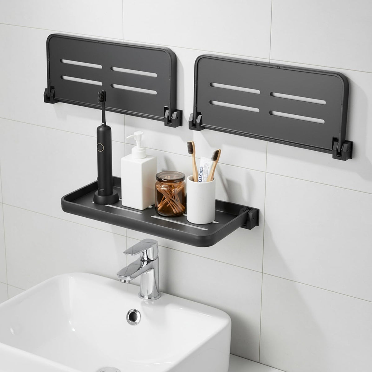 Xaajooio front view of three dark gray fold-down shelves showing compact kit benefit
