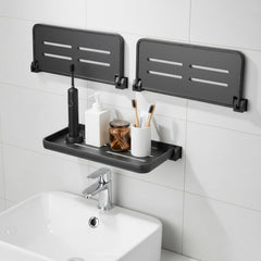 Xaajooio front view of three dark gray fold-down shelves showing compact kit benefit