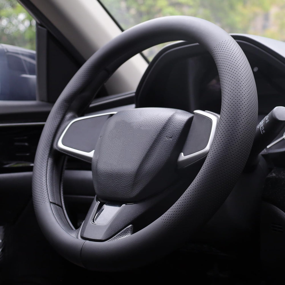 XHRING installed on Toyota Camry steering wheel for improved interior look