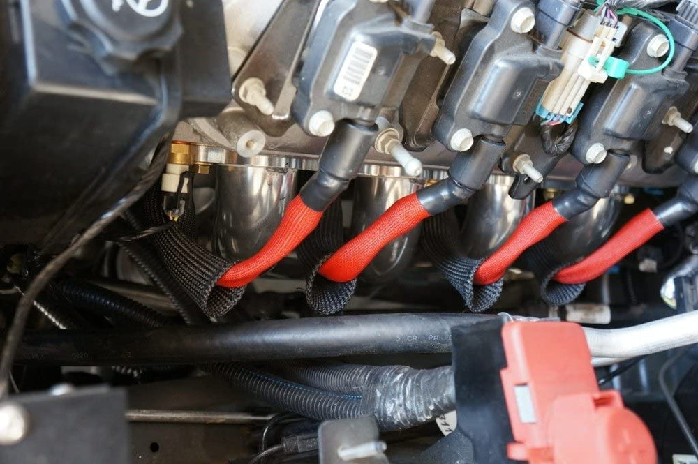 XINPENGLIU sleeve sliding over spark plug boot showing tool-free install