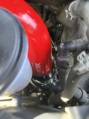 Xotic Performance stainless spring-loaded T-bolt clamp detail ensuring leak-free connection