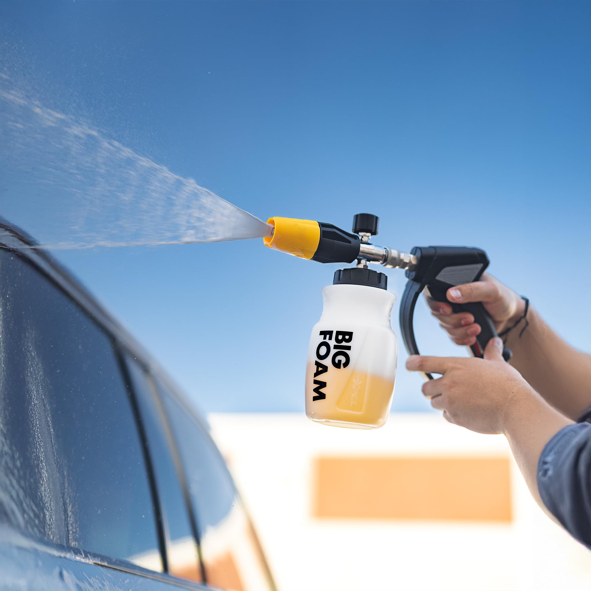 XPEL foam wash scene in driveway showing professional-looking results quickly