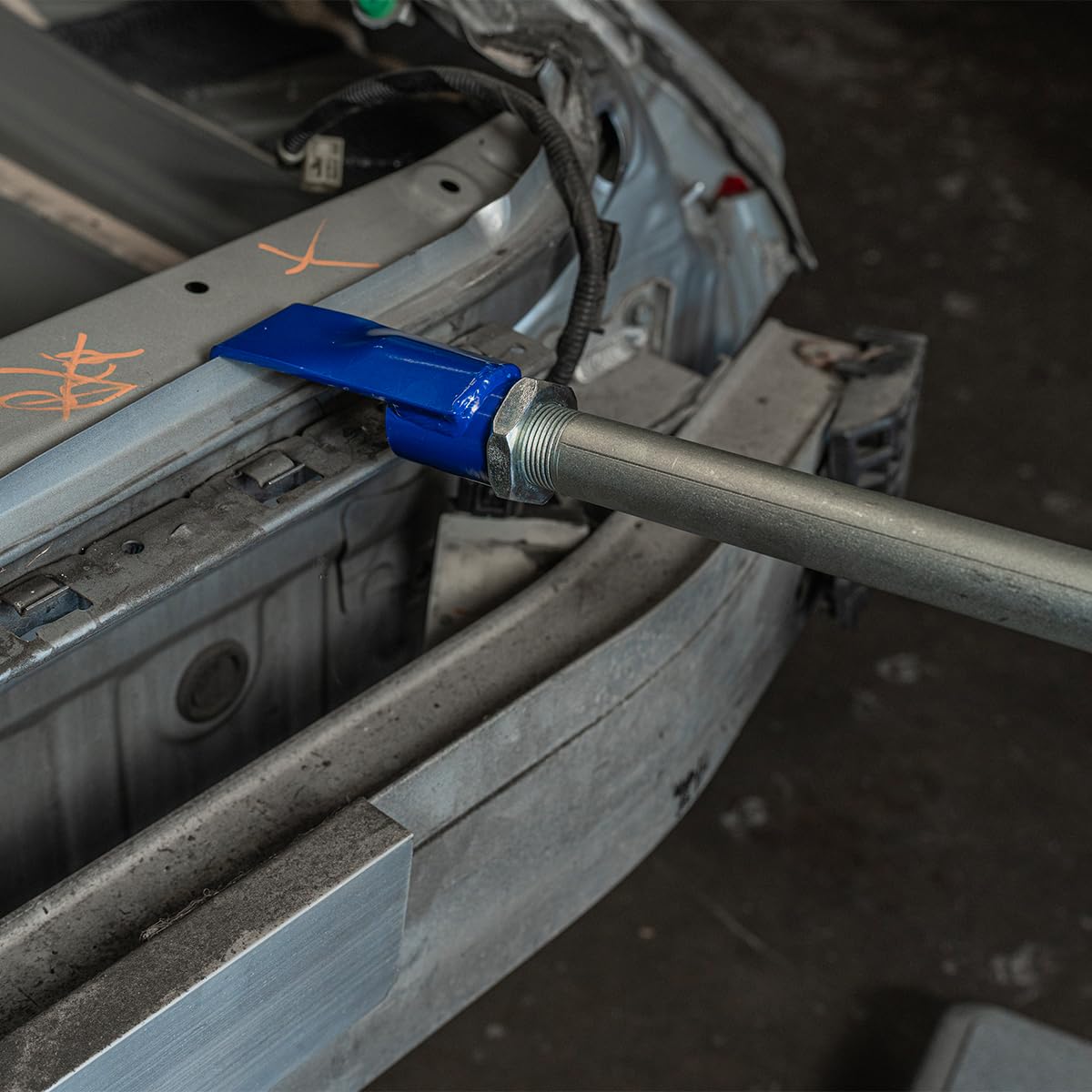 XtremepowerUS slide hammer in use removing a car dent demonstrating effective extraction