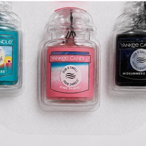 Yankee Candle Iced Berry Lemonade hanging from mirror for bright citrus benefit