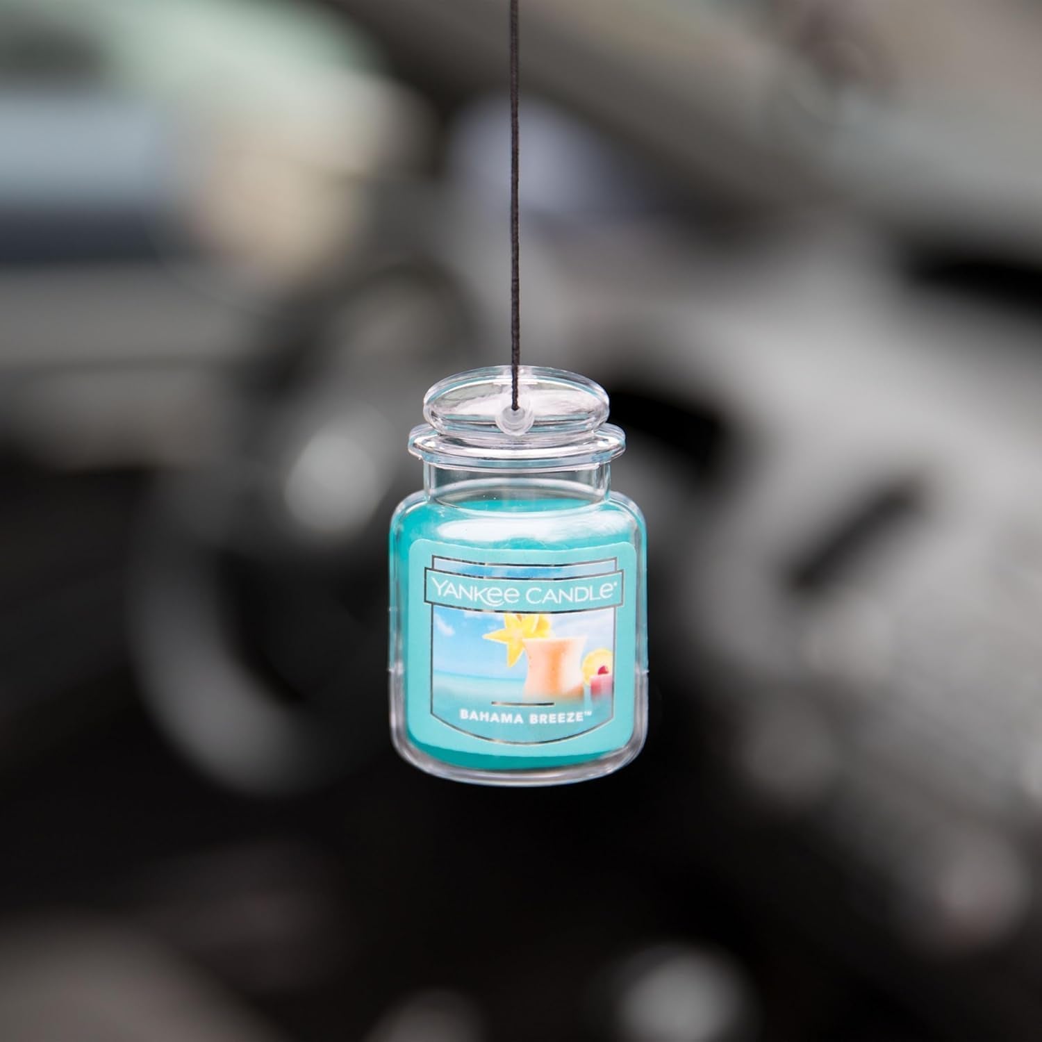 Yankee Candle Car Jar in closet lifestyle shot keeping clothes smelling fresh