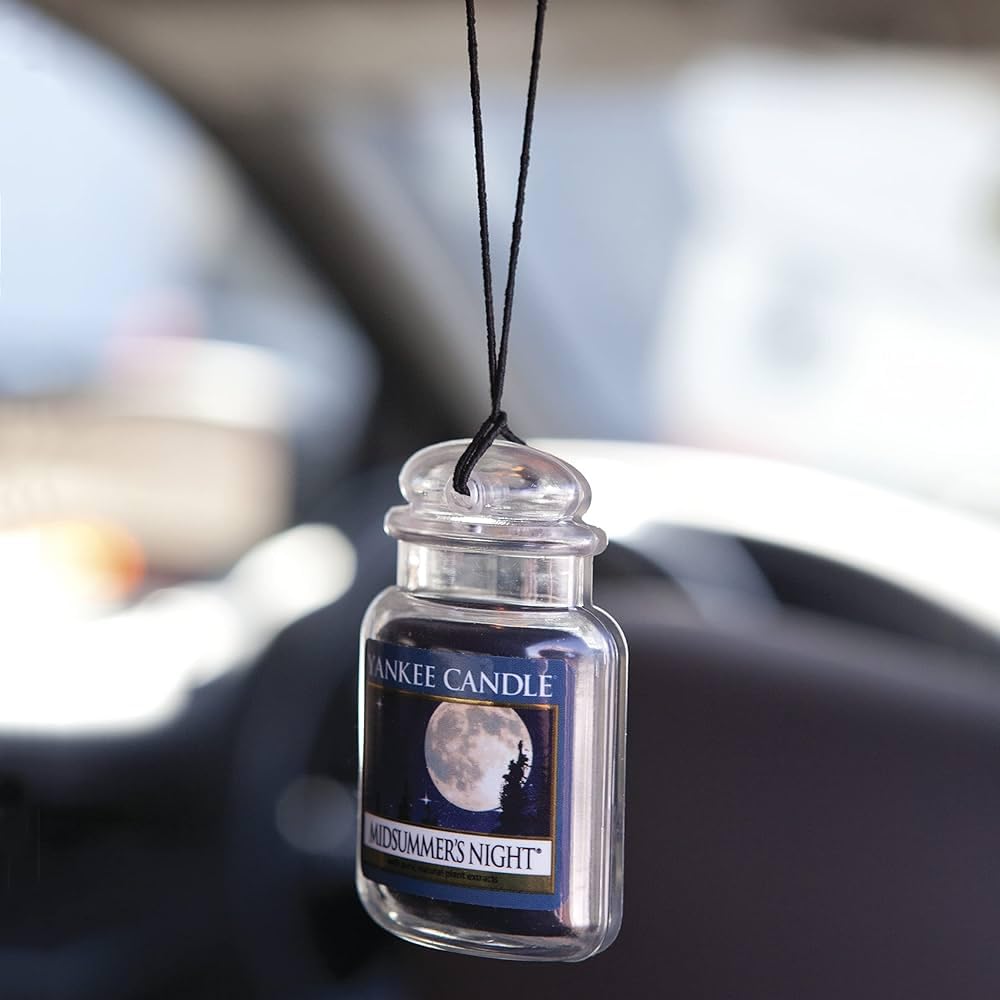 Yankee Candle Vanilla Cupcake in car cupholder for warm comforting scent benefit