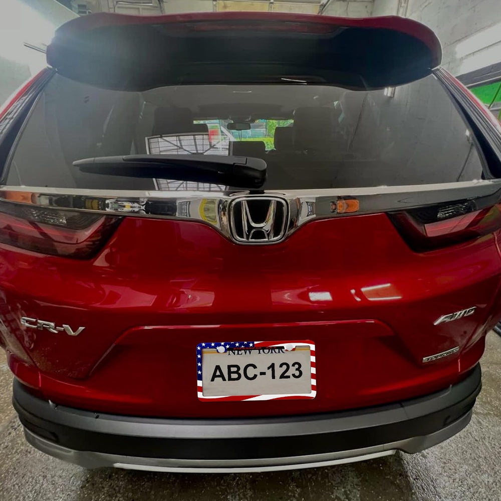 Yogrvner framed license plate in driveway illustrating finished vehicle look