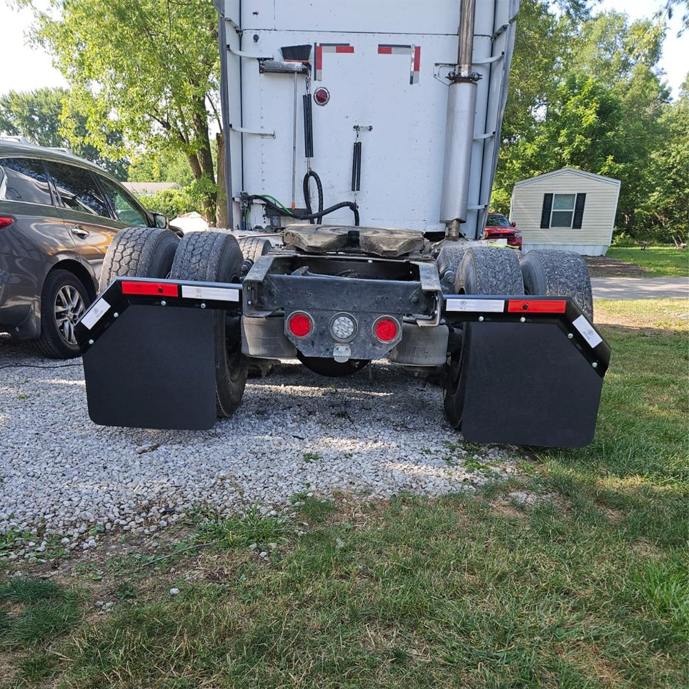 ZANURA mud flaps on a tractor-trailer reducing spray in highway conditions