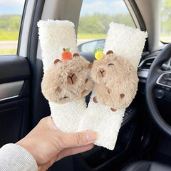 Zigihos front view of two capybara seat belt cover pads showing cute design and benefit of comfort