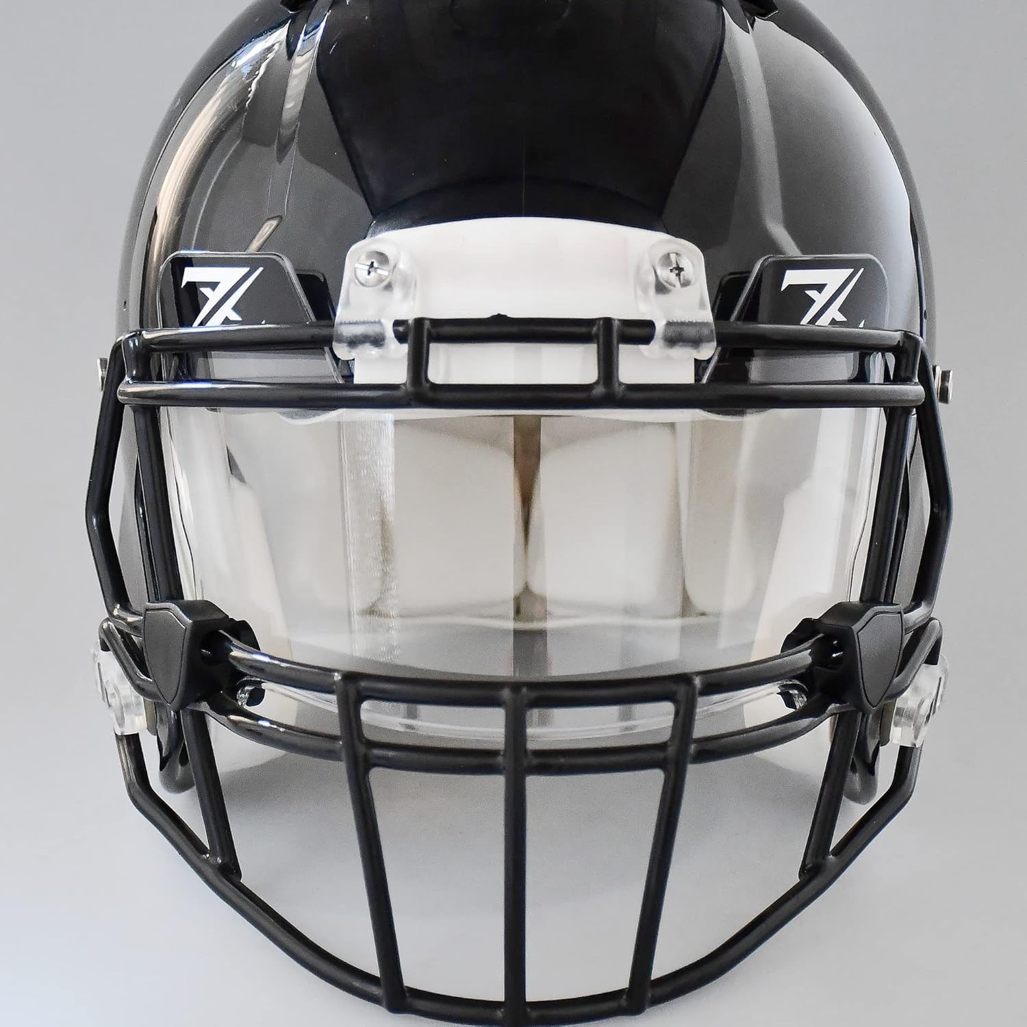 ZIXIOYS visor mounted on youth helmet demonstrating improved glare control