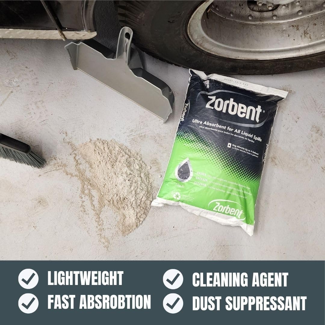 Worker sweeping Zorbent saturated granules for easy removal